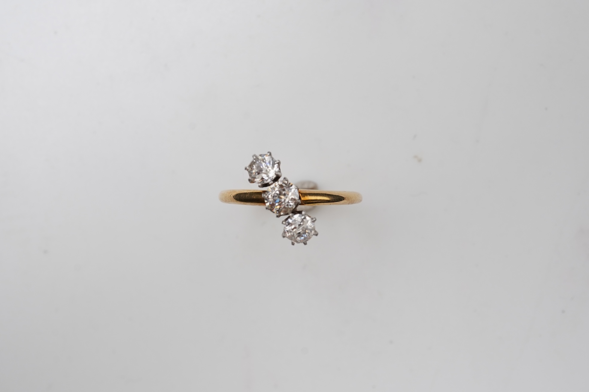 A diamond three-stone ring, early 20th century